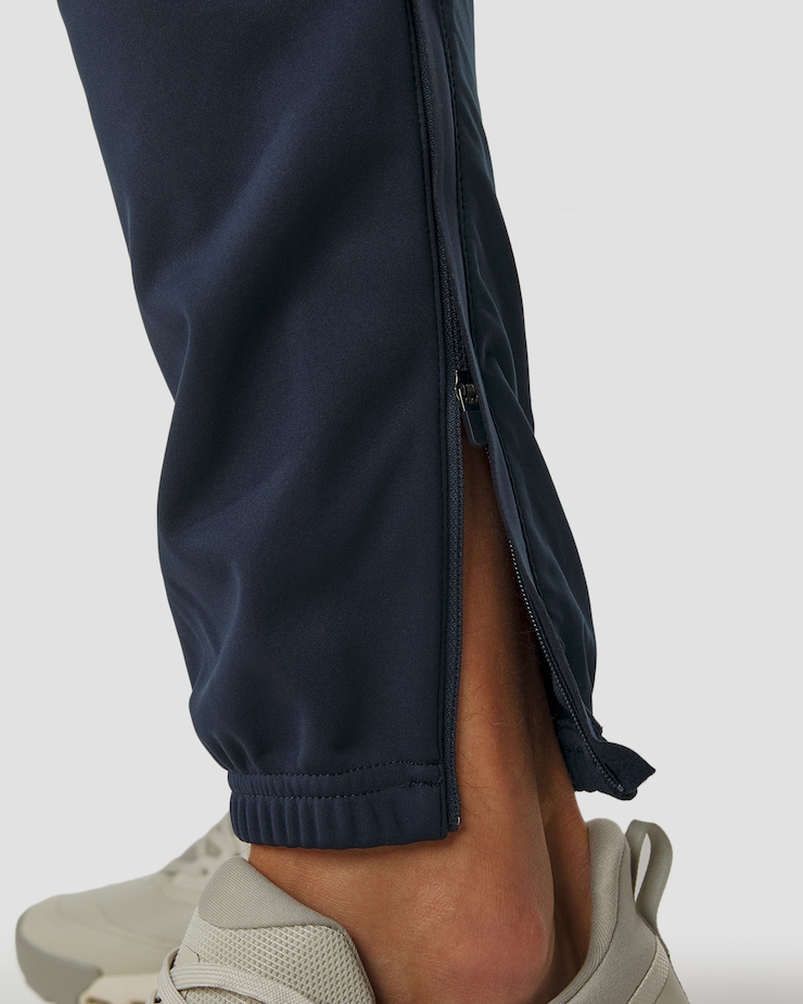 Pánské skitouringové kalhoty Odlo Essential Warm Pants v modré barvě